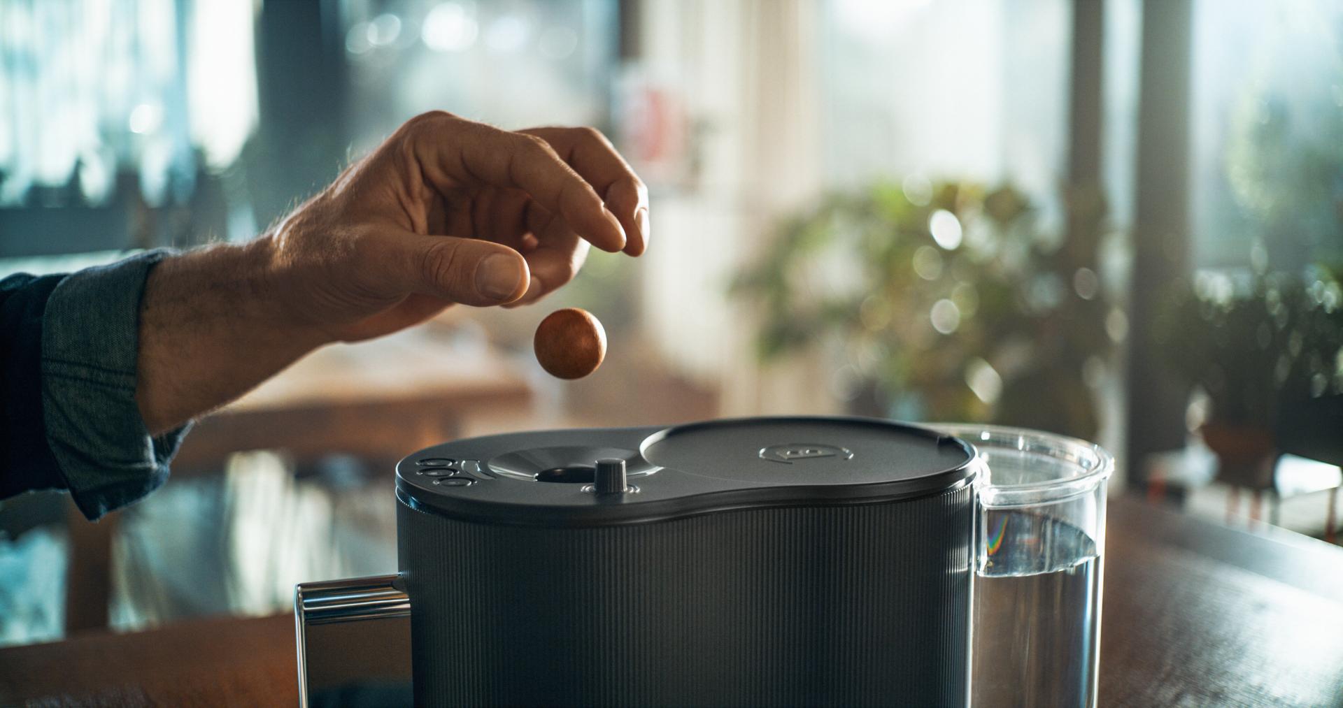 CoffeeB ball into coffee machine